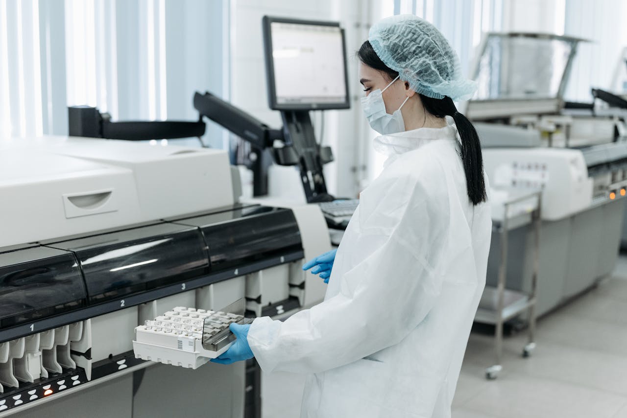 Medical Practitioner holding a Rack of Test Tube Samples